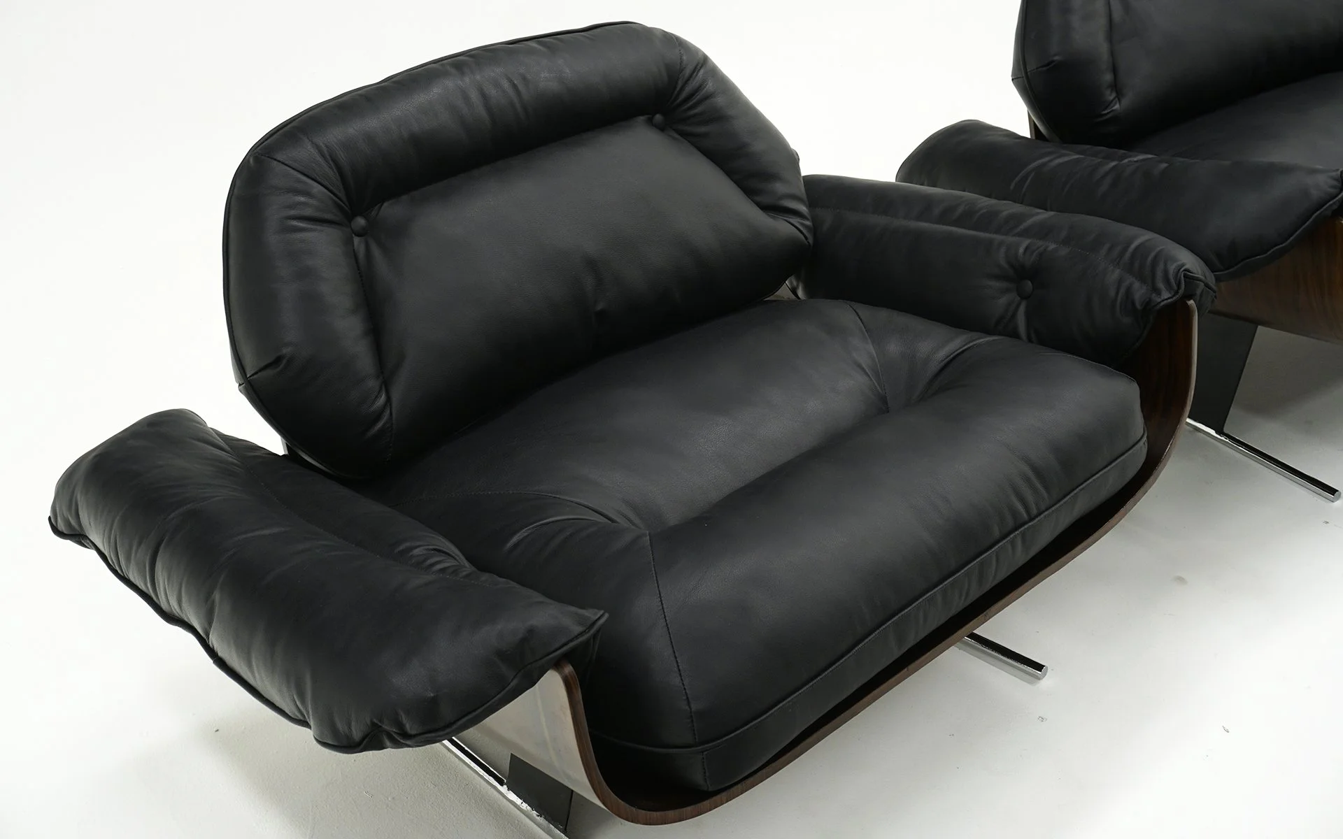 Pair Jorge Zalszupin lounge Chairs in Black Leather and Brazilian